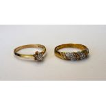 A 9ct gold and diamond single stone ring, claw set with a circular cut diamond,