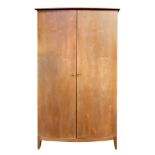 Heals; a contemporary bowfront wardrobe enclosed by a pair of doors, 110cm wide, 66cm deep,