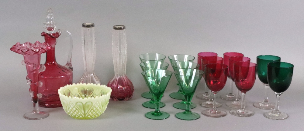 Six Cranberry bowl drinking glasses, similar claret jug and trumpet shaped vase, a bowl,