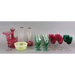 Six Cranberry bowl drinking glasses, similar claret jug and trumpet shaped vase, a bowl,