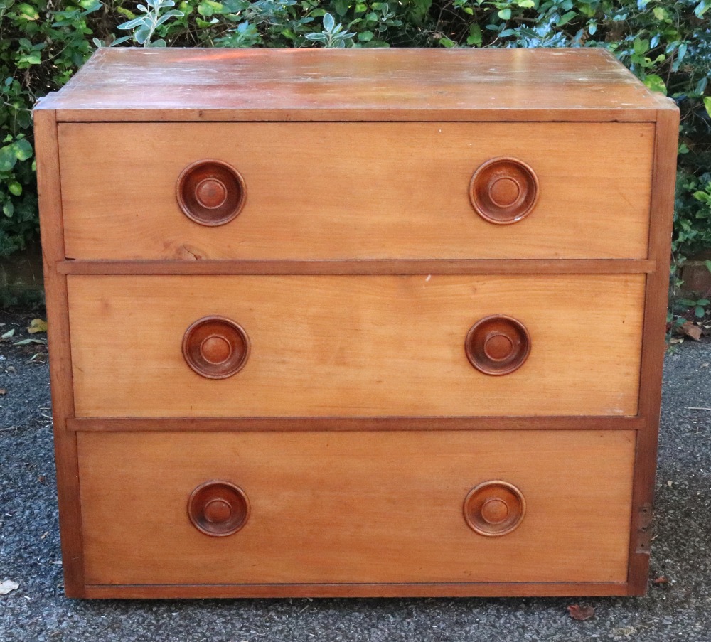 A Victorian mahogany chest of three long drawers, originally part of a larger piece of furniture,