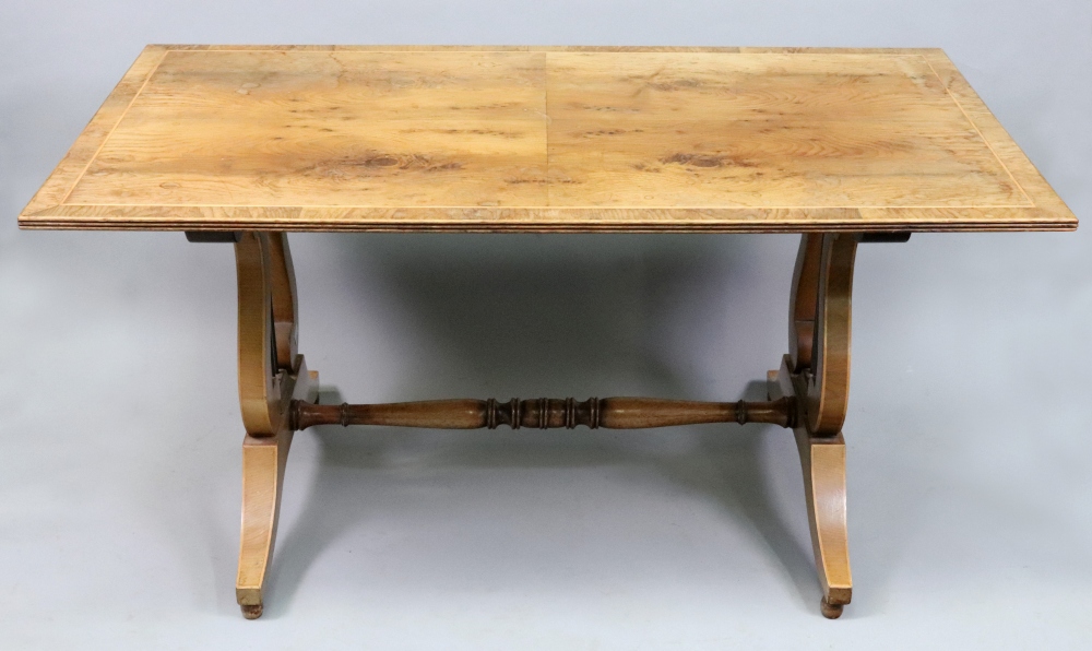 A reproduction yew-wood veneered boxwood strung low centre table, 92cm wide x 51.