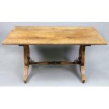 A reproduction yew-wood veneered boxwood strung low centre table, 92cm wide x 51.