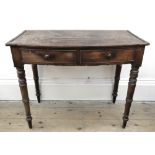 A late Regency mahogany bowfront two drawer dressing or writing table,