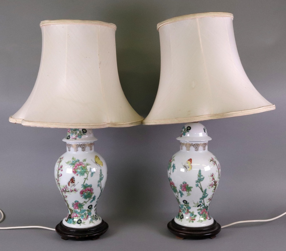 A pair of modern 'famille rose' vase shape table lamps and shades,