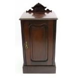 An Edwardian walnut pot cupboard, 44cm wide x 37cm deep x 87cm high and another of similar period,