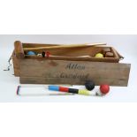 A vintage Atlas croquet set, in wooden carrying case, the case 103cm wide.