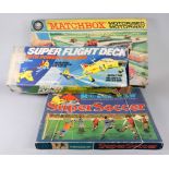 Matchbox Motorised Motorway, Airfix Super Flight Deck and Rotadraw Super Soccer, all boxed.