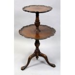 A reproduction George III style mahogany miniature two tier dumb waiter,