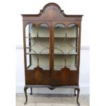 An Edwardian mahogany glazed display cabinet, 112cm wide x 37cm deep x 196cm high.