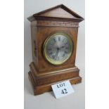 A Victorian mahogany cased chiming mantel clock of architectural form,