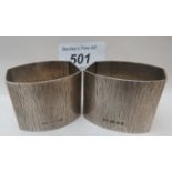 A pair of silver hallmarked napkin rings, London 1988,