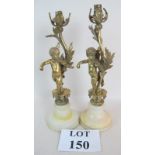 A pair gilt-bronze candle holders/table lamps, c1910/1920, depicting cherubs playing violins,