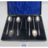 A set of six silver teaspoons with apostle terminals and matching sugar tongs, Birmingham 1991,
