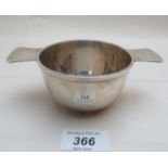 A silver porringer with lug handles Birmingham 1930 est: £60-£80