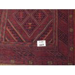 A hand knotted woollen carpet est: £40-£60