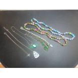 An assortment of necklaces and pendants est: £25-£35