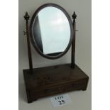 A 19th century mahogany vanity mirror, inlaid with box-wood stringing, oval swing mirror,