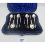 A set of six silver apostle teaspoons London 1898 and a pair of sugar tongs London 1905 boxed est: