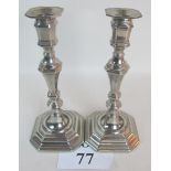 A pair of silver plated period-style candlesticks, 20th century,