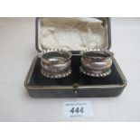 A pair of silver engraved napkin rings, Birmingham 1901,