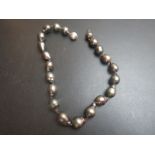 A pearl necklace with an 18ct gold and diamond clasp est: £80-£120