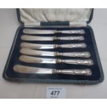 A set of six silver King's pattern handled tea knives, boxed,