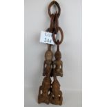Tribal Art: A series of four carved wooden kneeling figures,