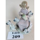 A Lladro group depicting young girl with Dalmatian puppies,