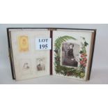 A Victorian photograph album containing Victorian portrait photographs est: £20-£40 (B14)