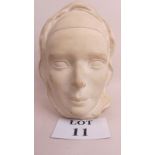 Emma Dexter (20th/21st century) - 'Female Head', carved stone, signed and dated 02, 25 cm high.