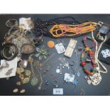 An assortment of mainly costume jewellery, to include a small topaz pendant,