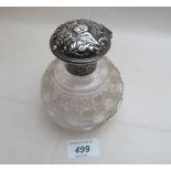 A hobnail cut scent bottle with silver hinged top and inner stopper,