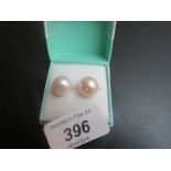A pair of pearl earrings est: £25-£45