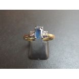 An 18ct gold sapphire an two diamond ring (size Q) est: £150-£200