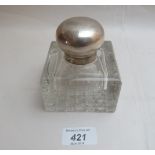 A heavy hobnail cut base glass inkwell with silver mount,