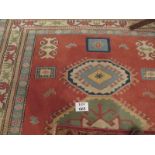 A large wool carpet on pale, pink, blue ground (2.80 x 2.