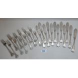 A set of twelve King's pattern silver fish knives and forks 105oz approx London 1967 est: £80-£120