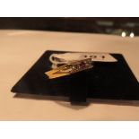 An 18ct gold diamond and ruby set ring (size P) est: £100-£130