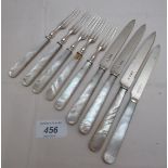 A set of silver fruit knives and five forks with mother of pearl handles Sheffield 1928 est: