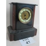 A Victorian black slate and rouge marble cased mantel clock, incised decoration,
