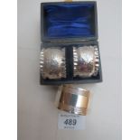 A pair of silver napkin rings Sheffield 1915 and another silver napkin ring fully hallmarked est: