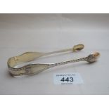 A pair of Victorian silver gilded sugar tongs,