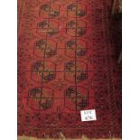 An early 20th century Persian rug on Burgundy ground (170 x 106 cm approx) est: £30-£50