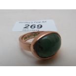 A 9ct gold heavy ring with jade stone (size O-P) est: £150-£180
