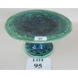 A late 19th/early 20th century green Majolica pedestal base stand, approx.