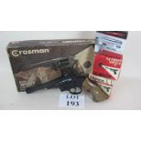 A Crosman 38T/177 six shot boxed co2 powered double action revolver and co2 cartridges & pellets
