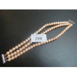 A three row pearl bracelet with 925 stamped clasp est: £20-£40