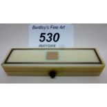 An Edwardian ivory and gold pin box est: £100-£150