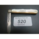 A silver and mother of pearl pen knife est: £15-£25